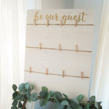 Load image into Gallery viewer, Be our guest seating chart sign with twine and clothespins. Hand painted wedding sign by Perryhill Rustics