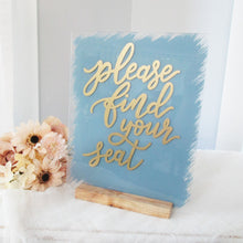 Load image into Gallery viewer, Dusty blue and gold find your seat acrylic hand painted wedding reception sign by Perryhill Rustics