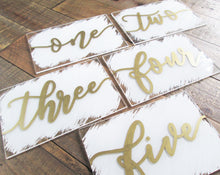 Load image into Gallery viewer, White and gold worded calligraphy acrylic table numbers by Perryhill Rustics
