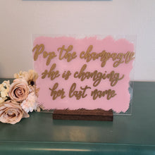 Load image into Gallery viewer, Pop The Champagne, She&#39;s Changing Her Last Name Acrylic Bubbly Bar Sign
