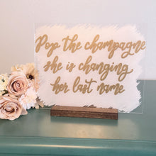 Load image into Gallery viewer, Pop The Champagne, She&#39;s Changing Her Last Name Acrylic Bubbly Bar Sign
