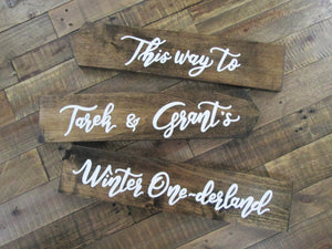 Wooden directional signs by Perryhill Rustics