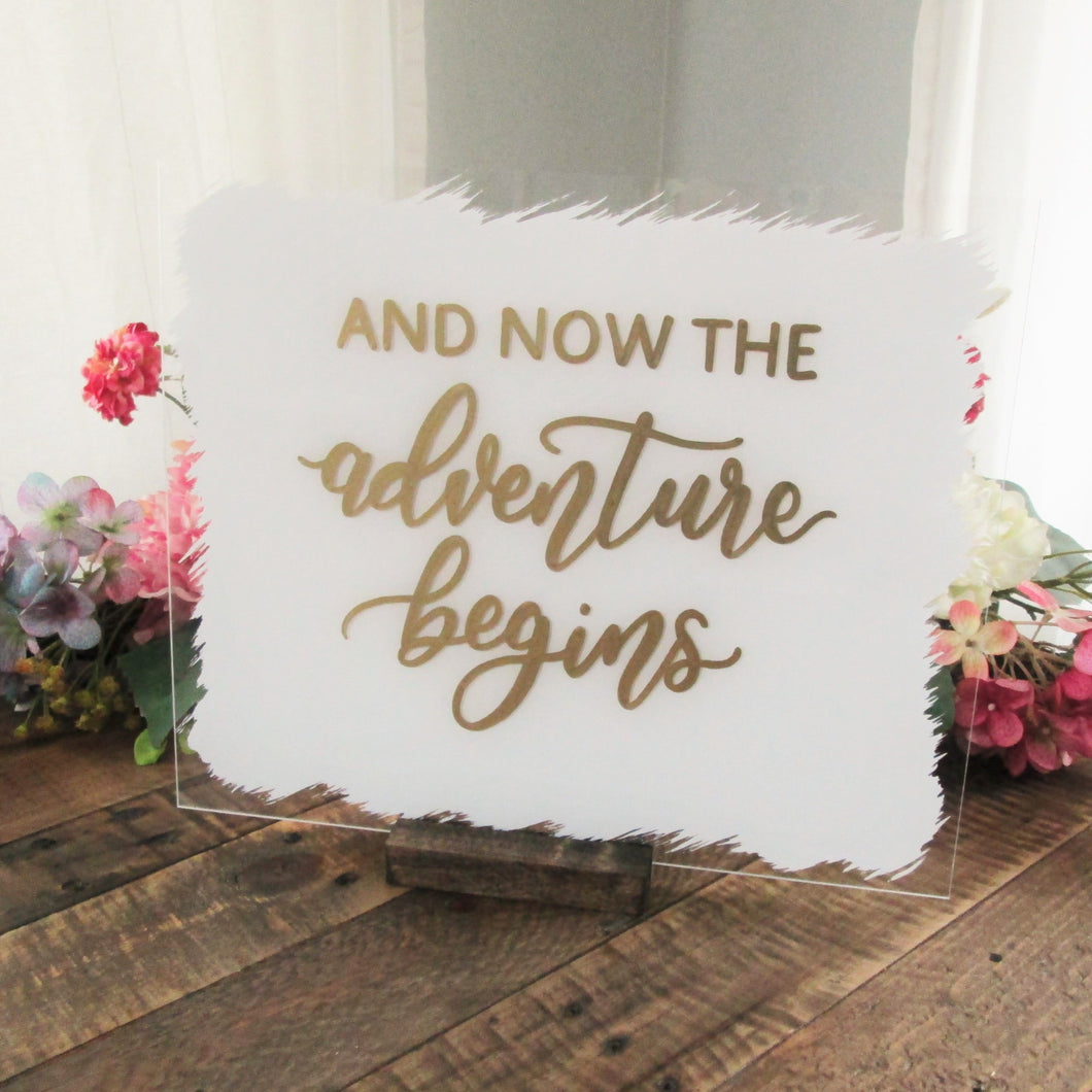 And Now The Adventure Begins Acrylic Wedding Sign with Stand