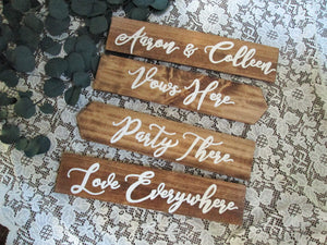 Wooden directional signs by Perryhill Rustics