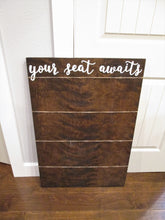 Load image into Gallery viewer, 24x36 dark walnut your seat awaits rustic wooden seating chart sign by Perryhill Rustics. Hand painted wedding decor and signs!
